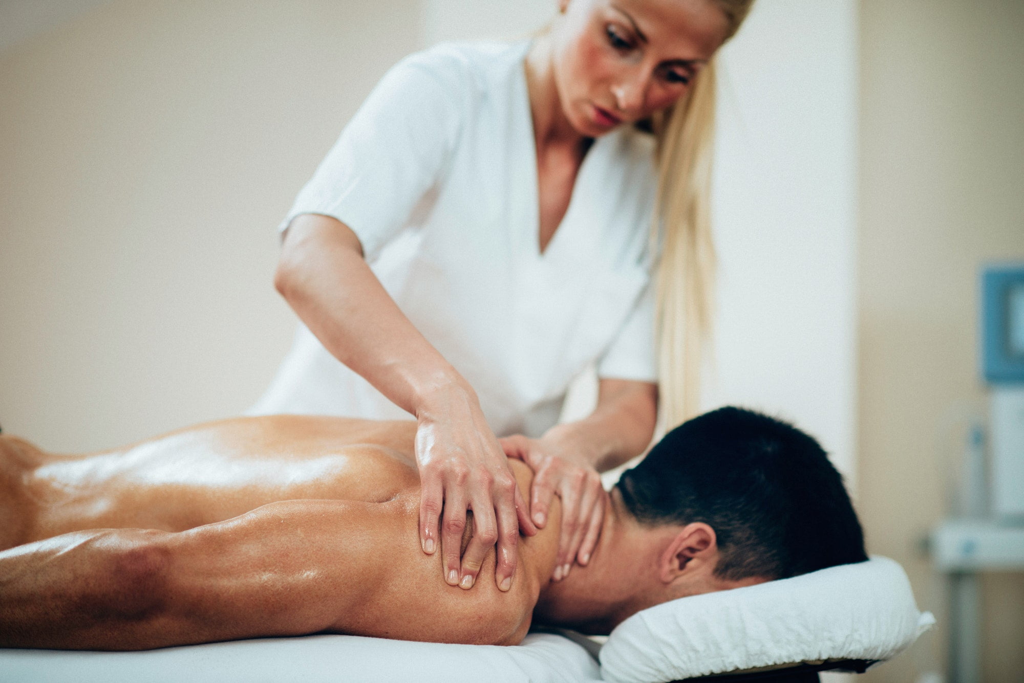 sports-massage-therapist-doing-shoulder-massage.jpg